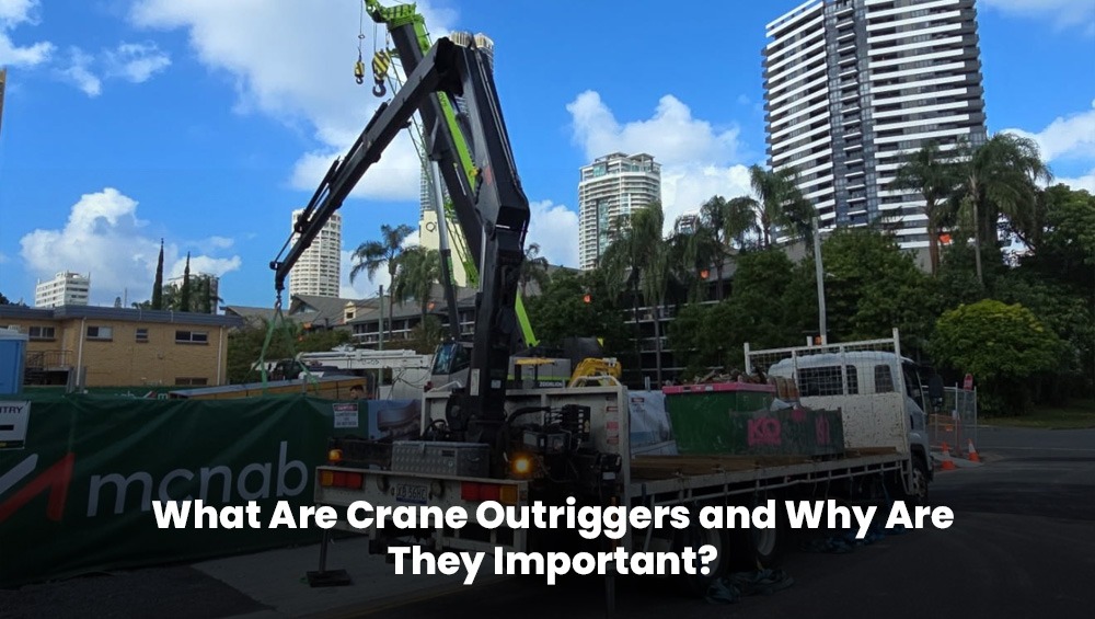 Crane with extended outriggers for safe lifting on a construction site